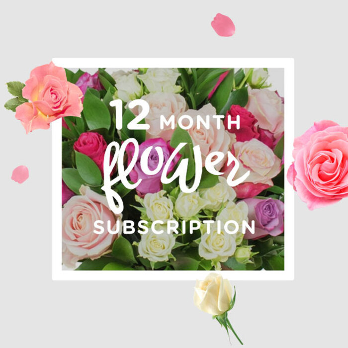 This image presents a richly detailed bouquet of roses, styled as if ready to be carried through the leafy streets of Gerrards Cross for a year of thoughtful gifting. The camera lingers on the roses themselves, revealing a layered mosaic of colours: soft blush and shell pink, creamy whites with a hint of champagne, deeper raspberry notes, and sudden flashes of bright fuchsia. Each bloom varies slightly in size and openness, some shaped like perfect cups, others fully opened to reveal their spiralling hearts. Nestled between them, glossy green leaves create contrast and depth, framing the flowers much as the trees frame the paths around Gerrards Cross Common. The light in the image is gentle and flattering, picking up the satiny sheen of each petal and suggesting the dewy freshness that comes with expertly timed delivery. Surrounding the central bouquet, loose petals and small blossoms hover against a warm, neutral background, giving the composition a sense of movement, as though a breeze has just brushed past. The scene beautifully evokes the idea of a 12-month flower subscription-each new bouquet arriving to renew the atmosphere of a room, from calm home offices to cosy living spaces. A quiet joy runs through the arrangement, suitable for birthdays, anniversaries, thank-yous, or simply brightening the week for someone in Gerrards Cross. The craftsmanship hints at a florist who understands both seasonal rhythm and personal sentiment, turning roses and foliage into an ongoing story of comfort and celebration.