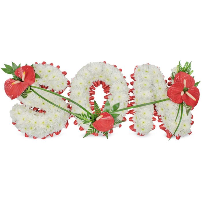 A bespoke funeral flower tribute spells out the word SON in striking, block-style capitals, presented against a clear white backdrop so the design stands out with quiet dignity. The letters are completely filled with pristine white chrysanthemums, each small bloom tucked closely beside the next, creating a dense, velvety surface that appears soft to the touch and evokes peace and purity. Beneath and around this blanket of white, a luxurious red ribbon forms a scalloped border, carefully pleated to follow every curve of the 'S', the roundness of the 'O', and the clean lines of the 'N'. This ribbon peeks out at the edges and through inner contours, adding precise definition and a heartfelt hint of colour associated with deep love and devotion. Three distinct groupings of red anthuriums bring an elegant focal point to the tribute. On the upper left section of the 'S', several anthuriums with glossy, heart-shaped spathes sit among a cluster of dark green foliage. A single anthurium rests gently in the lower curve of the 'O', like a small, private note of remembrance. On the 'N', a more generous spray of anthuriums and lush greenery, including fern fronds and broad leaves, is placed at the top right, balancing the entire composition. Slender green leaves weave lightly across the chrysanthemums, tying the three groupings together in a natural arc. This arrangement, similar to those often requested for services in and around Gerrards Cross, from quiet family gatherings to larger church funerals, serves as a meaningful, personalised expression of love and grief for a much-missed son.