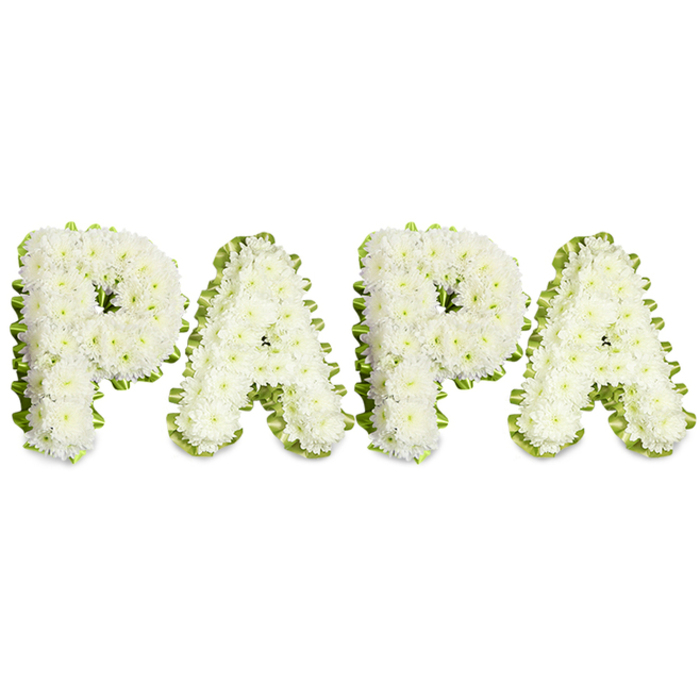 A carefully composed memorial piece that reads PAPA in bold uppercase letters, each letter sculpted from compact clusters of small white chrysanthemums to produce a textured, pillowy surface. The white blooms are closely set so the form reads as continuous and serene, while a soft rim of pale green ribbon or slender foliage outlines each character with a subtle ruffle that lifts the letters from the pure white background. The overall effect is one of calm simplicity-white for purity and peace, green for renewal and delicate contrast-intended to comfort and convey deep respect at a funeral or memorial. Light falls evenly across the arrangement, revealing the slight dome of petals and the gentle shadows in the petals' folds; the faint scent of fresh chrysanthemums seems to hover, familiar and consoling. From the vantage of a florist arranging this piece for display along Gerrards Cross High Street, Station Road or at a church in nearby Denham or Chalfont St Peter, you would mind the spacing between letters, the neatness of the ribbon edge and the balance of the row so the name reads plainly to visitors. This personalised floral lettering is most often selected to honour a father or grandfather, a quiet yet unmistakable expression of familial love, respect and remembrance, presented with the craftsmanship and sensitivity such occasions deserve.