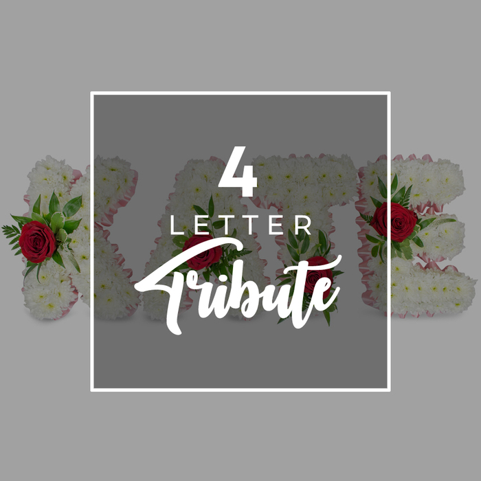 In this carefully composed promotional image, the quiet dignity of a four-letter funeral tribute is captured with understated elegance, reminiscent of the tasteful memorials often seen at services in and around Gerrards Cross. The scene is set against a smooth, pale grey background that recedes softly, allowing the central design to stand out without distraction. At the centre, a dark grey square sits like a subtle window, its surface semi-transparent and framed by a slender white line that visually sharpens the edges. Within this square, white lettering is stacked vertically: a bold number 4 at the top, the word LETTER beneath in a neat sans-serif style, and finally Tribute written in an airy, flowing script that arcs gently across the lower half of the panel. Behind this translucent area, four floral letters are arranged in a row, although their full shapes are partly veiled by the overlay, inviting the viewer to look more closely. Each letter is built from a dense mass of pristine white chrysanthemums or similar small-headed blooms, their petals forming a uniform, cushiony surface that catches the light in soft highlights and shadows. A delicate band of pale pink ribbon wraps along the sides, just visible where the flowers meet the base, lending a faint blush of colour. Scattered thoughtfully across the letters are deep red roses and sprigs of fresh greenery, likely fern or ruscus, adding depth, contrast, and a sense of living movement. The roses anchor the tribute emotionally, suggesting love, memory, and respect. Overall, the image communicates how a florist can transform a simple word into a bespoke floral memorial piece, suitable for a church, crematorium, or graveside farewell nearby.