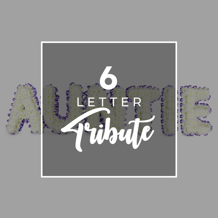 Elegantly crafted as a six-letter memorial tribute, this Gerrards Cross arrangement spells AUNTIE in freestanding letters formed from densely packed white chrysanthemums. The result is a full, soft sculpture of blooms, each letter edged with a rich purple trim-either from tiny purple flowers or a narrow ribbon-creating crisp definition against a neutral gray background. A white square overlay sits at the center of the display, presenting 6 LETTER Tribute in solid sans-serif white type and Tribute in an elegant script beneath. The overall effect is one of refined symmetry and meaningful personalization, ideal for a funeral, wake, or memorial service.

The composition conveys both loss and gratitude; the white blooms suggest purity and peace, while the purple accents add warmth and dignity. The scent is gentle and clean, and the petals feel velvety, inviting a quiet, reflective pause. As a local florist in Gerrards Cross, we design such bespoke tributes to honor a beloved Auntie, often coordinating with funeral directors in the area to ensure timely delivery and proper placement. The piece is crafted to withstand the formalities of a service while keeping a soft, human touch that families remember long after the day ends. Its presence can rest in a church hall pedestal or a quiet corner of a family home, becoming a memory recalled at anniversaries and shared among neighbours along the High Street, Station Road, and the wider Bucks countryside that surrounds Gerrards Cross.