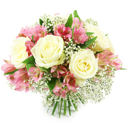 A rounded, dome-shaped bouquet of white roses, pink alstroemeria, and dainty white gypsophila is set against a spotless white backdrop, giving the flowers a floating, almost weightless presence. At the heart of the design, several generous white roses bloom in layered rosettes, their velvety petals curling outward in creamy spirals tinged with the faintest wash of pale lemon at the core. Threaded gracefully among them, clusters of pink alstroemeria offer a cheerful, contemporary note; each bloom carries multiple petals in shades that shift from soft pastel pink at the outer edges to vivid fuchsia near the throat, where fine stripes and freckles deepen the colour. Baby's breath is sprinkled throughout like a dusting of fresh snow, its tiny white blooms on slender stems adding softness and lightness, so the bouquet feels full yet beautifully airy. A collar of rich green foliage peeks from beneath the flowers, suggesting sturdy, freshly cut stems that are bundled neatly together and visible at the base. The bright, even lighting reveals every fold and texture, from the satin-like rose petals to the slightly ruffled lily blossoms. The overall mood is serene and heartfelt, as if the bouquet has just been crafted in a Gerrards Cross flower studio ready for same-day delivery across the village, from homes near West Common to offices close to the station. It would look perfectly at home on a kitchen table after a morning stroll along the Common, a graceful choice for anniversaries, thank-you gestures, or a gentle sympathy tribute sent with care.