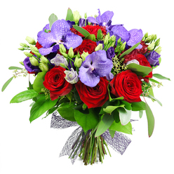 Imaginatively composed for a client in Gerrards Cross, this bouquet unfolds as a sensorial journey. The plush crimson roses emit a warm, intimate perfume that grounds the arrangement, while the regal purple Vanda orchids lounge among them, their broad petals laced with delicate speckles. Intertwined through are sprays of Lisianthus-soft lilac tones with buds still closed-adding a sense of calm and anticipation. A lush backbone of green foliage-glossy leaves, with whispers of eucalyptus-provides depth and a garden-fresh vigor that makes the bouquet feel alive. Small green buds nestle throughout, some elongated and others plump, emphasizing freshness and future blooms. Subtle clusters of pale green fillers thread the composition, enhancing texture without overpowering the main blooms. The stems are gathered and secured at the base with a dark, open-weave mesh ribbon, a contemporary finishing touch that lets the stems breathe and adds a touch of sculptural elegance. The overall mood is dramatic yet intimate, versatile enough for a romantic anniversary, a grand dinner party in Gerrards Cross, or an extravagant thank-you. For those seeking reliable freshness and thoughtful gifting, Flower Delivery Gerrards Cross offers same-day delivery across the area, ensuring your message arrives with fragrance and flair.