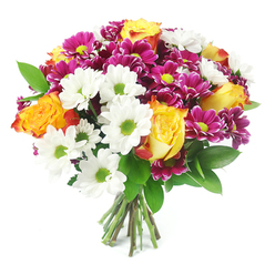 A bright, exuberant bouquet fills the centre of the image, photographed straight on against a clean white background so that every colour and texture stands out, much like a shop window display along Packhorse Road in Gerrards Cross. The flowers are arranged into a full, rounded shape, giving a sense of abundance and generosity. Dominating the composition are large, fully opened roses in warm gradient tones: their petals begin as a glowing golden yellow at the core, then subtly deepen into burnt orange and soft reddish-orange at the edges, creating a sunlit, almost sunset effect. Threaded between these roses are clusters of white daisy-style chrysanthemums, each with a vivid lime-green centre that feels lively and fresh, adding a crisp brightness similar to morning dew on West Common. Richly coloured magenta and fuchsia chrysanthemums are woven throughout, their tightly layered petals forming plush, rounded heads with yellow-green centres that visually link them to the white daisies, adding balance and harmony. Dark green foliage, likely ruscus or similar leafy greens, is carefully placed among the blooms, offering structure and a deep, natural backdrop that makes the flower heads appear to float. The stems are gathered together neatly at the base, freshly cut and visible, indicating a hand-tied bouquet created with intention and skill, ready for delivery to a home or office in Gerrards Cross. The overall mood is joyful yet refined, suitable for celebrating milestones, offering thanks, or simply brightening someone's day with a colourful reminder of the changing seasons in the local Buckinghamshire countryside.