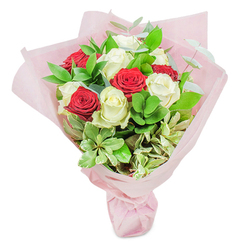 This luxurious bouquet, expertly crafted by a Gerrards Cross florist, radiates a timeless blend of romance and gentle sophistication, reflecting the refined charm of this leafy Buckinghamshire community. The bouquet features a perfectly balanced arrangement of twenty sumptuous roses-half in rich, velvet red and half in immaculate, creamy white-each rose head artfully positioned to enhance the graceful interplay of colours. Between the blooms, a lush blanket of deep green ruscus, round variegated greenery, and silvery eucalyptus flows outward, giving the arrangement depth and a sense of abundant vitality reminiscent of Gerrards Cross's tree-lined avenues and tranquil parks. The carefully chosen foliage includes hints of light green and cream, rounding out the spectrum and infusing the bouquet with subtle variation in both hue and texture. Every petal and leaf appears crisp, dew-fresh, and alive, enveloped by several layers of delicate blush-pink wrapping-its translucence echoing the gentle English light filtering through a window on a serene morning. Tied securely at the base, the bouquet evokes a sense of unity and joy, ideal for moments of affection, heartfelt congratulations, or the marking of significant anniversaries. There is a quiet, uplifting energy to the design, and its fragrant notes whisper of garden walks and summer breeze along Bulstrode Way. This arrangement, available for thoughtful gifting throughout Gerrards Cross, is a true statement of care and quality-a floral embrace to cherish and remember.