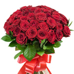 Displayed with striking clarity against a crisp white background, this sumptuous bouquet of approximately fifty radiant red roses radiates abundance and artistry-an arrangement masterfully crafted by local Gerrards Cross florists whose expertise is matched only by their dedication to the area. The deep crimson roses are tightly clustered to create a magnificent, rounded dome, their velvety petals unfolding in intricate spirals that merge freshness with luxury. Between the blooms, rich green leaves add vibrancy and depth, their gloss a natural counterpoint to the soft, matte texture of the petals. Each stem is gathered and secured with a wide, gleaming satin ribbon in matching red, tied into an extravagant bow whose flowing tails provide a sense of drama and celebration reminiscent of gatherings by Gerrards Cross Golf Club or along the winding residential lanes. Bathed in soft, ambient light, the arrangement exudes romance, elegance, and timeless passion-qualities that make it a quintessential choice for milestone anniversaries, heartfelt love notes, or significant celebrations throughout Gerrards Cross. With every element intentionally selected and thoughtfully presented, this image captures the enduring appeal of red roses as the area's emblem of affection and sophisticated taste.