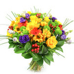Against a crisp white backdrop, a hand-tied bouquet blooms in a rich, rounded dome of colour, capturing the feel of a sunny celebration in Gerrards Cross. At the forefront, classic yellow roses open in precise spirals, their layered petals soft and velvety, surrounded by a generous scattering of yellow chrysanthemums and daisy-like flowers that radiate warmth and cheer, as if echoing golden light over nearby East Common. Bold orange gerbera daisies punctuate the arrangement, their flat, symmetrical petals forming bright circles around darker centres, adding both structure and a lively, modern edge. Woven through this warm palette, deep purple lisianthus flowers unfurl with a graceful, rose-like form, their ruffled petals adding depth and a cool, sophisticated note, complemented by a few paler lavender and white buds that hint at blossoms just beginning to open. Lime-green button chrysanthemums dot the bouquet with playful, spherical blooms, providing crisp, fresh contrast and a tactile, almost cushion-like texture. Between the petals, clusters of glossy red hypericum berries gleam like tiny jewels, lending festive charm and visual rhythm to the piece. Delicate blades of ornamental grass rise and fan gently outward, giving the composition a touch of height and dynamic movement, as if stirred by a breeze along the tree-lined roads near Bulstrode Park. The flowers are cradled by a collar of broad, dark green foliage, whose smooth, slightly waxy leaves frame the brighter hues and anchor the design. Below, the stems are cleanly cut and tied in a neat bundle, reinforcing the impression of a freshly prepared gift-an uplifting bouquet well suited to birthdays, get-well wishes, or simply bringing a joyful burst of colour into a Gerrards Cross home.