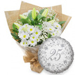 The image presents a classic silver anniversary gift pairing, as though prepared by a local Gerrards Cross florist for delivery to a long-married couple on a peaceful residential lane. On the left is a substantial hand-tied bouquet dominated by fresh white daisy chrysanthemums, their petals bright and clean, circling golden-yellow centres that radiate warmth. Tall, closed white lily buds rise among them, each bud sleek and slightly tapered, tinged with soft hints of green that suggest they will slowly unfurl in the days ahead. Scattered between these main flowers are light, feathery sprigs of baby's breath, whose tiny white blossoms add delicacy and a sense of airy fullness. Layers of rich dark green foliage cradle the blooms and frame the arrangement, providing contrast and structure. The entire bouquet is cosily wrapped in glossy clear cellophane and then swathed in textured brown kraft paper, the folds gathered and secured at the base, ready to be handed over on a doorstep near the Memorial Centre or a home overlooking East Common. To the right of the flowers, a round metallic silver foil balloon completes the celebratory scene. Its surface shimmers with intricate scrolling patterns and subtle floral motifs in deeper silver tones, reflecting light in soft ripples. At the centre, the number 25th is written in an elegant script, while the phrase Happy Anniversary repeats faintly across the background, reinforcing the theme without overwhelming the eye. Together, the pure whites, calm greens, and cool silver create a picture of refined joy and enduring commitment, perfectly suited to a Silver Anniversary celebration.