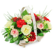 The photograph shows a tender funeral flower basket, the sort of arrangement a family in Gerrards Cross might choose to honour a loved one with quiet elegance. It is presented in a light, natural wood basket, oval in shape and slightly raised on small feet, with an arched, cream-toned handle curving gracefully above the blooms. The flowers rise in a generous dome, overflowing gently as if to surround the memory of the departed with warmth and care. At the centre are several creamy white roses, fully open, their soft, velvety petals layered in calm, symmetrical whorls that suggest purity, peace, and a gentle farewell. Clustered around them are deep red carnations, petals richly ruffled and abundant, creating pools of velvety crimson that convey enduring affection and respect. Here and there, variegated carnations appear, white or very pale pink petals edged with fine strokes of red, adding a whispered softness to the colour palette. Slender stems of small white blooms, like freesias, thread between the larger flowers, their bell-shaped blossoms bringing brightness and a sense of quiet hope. The flowers are supported by a generous frame of greenery: broad, glossy leaves that cradle the arrangement and delicate, feathery fronds that rise and trail at the edges, giving the display a natural, almost garden-like air. Photographed against a bright white background, every detail stands out clearly. The mood is serene, respectful, and comforting, suitable for placement beside a coffin, near a condolence book, or as a sympathy gift delivered to a home in the Gerrards Cross area after the funeral service.