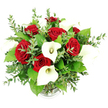 Against a spotless white background, a rounded bouquet of deep red roses and pure white calla lilies appears almost to float, its colours vivid and its textures sharply defined. The arrangement is photographed from a slightly elevated, eye-level angle, giving a clear view of the lush, full shape and the skilled workmanship that might be found in a boutique florist just off Packhorse Road in Gerrards Cross. In the centre, clusters of velvety crimson roses dominate, their petals tightly layered in generous, full blooms that suggest intense passion, devotion, and timeless romance. Rising gracefully between them, the white calla lilies introduce a sculptural elegance; each lily's smooth, trumpet-shaped spathe curves outward delicately, revealing a slender, creamy-yellow spadix that adds a hint of warmth. Around these statement blooms, an abundance of foliage provides structure and contrast: delicate stems of eucalyptus bear small, rounded, silvery-green leaves, giving the design a light, airy feel reminiscent of the gentle greenery around East Common, while broader, glossy green leaves lend solidity and richness. The flowers are gathered neatly into a clear glass vase, most of which is concealed by the density of stems and leaves, leaving only a subtle, ribbed base visible at the bottom of the image. Bright, even lighting casts soft shadows and brings out the natural sheen of each petal, making the bouquet ideal for romantic celebrations, elegant home styling, or wedding arrangements, and perfectly suited to thoughtful flower delivery across Gerrards Cross and neighbouring communities.
