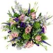 Captured from a bird's-eye view on a crisp white background, this bouquet looks like a circular burst of garden colour gathered at the height of bloom. At the core, generous roses in shades of soft blush, dusty pink, and gentle mauve open in intricate spirals, each petal overlapping the next to create a romantic, velvety heart. Around and between them dance clusters of delicate, lavender-toned aster-style flowers, their tiny petals framing sunny yellow centres that add a light, uplifting sparkle, reminiscent of wild daisies you might notice on a walk around Gerrards Cross's quieter lanes. Deeper notes appear in the rich purple and indigo lisianthus, their ruffled, bell-shaped blooms giving the arrangement depth and a touch of refined drama. Tall, slender spikes of Veronica rise through the design in clean lines of vivid purple, introducing rhythm and height, like brushstrokes in a painter's composition. Dotted throughout are playful globes of Dianthus Green Trick, their vivid, almost moss-like chartreuse texture forming sculptural contrasts against the softer blossoms. Silvery eucalyptus leaves curve around the edges, their matte, blue-green tones cooling the palette and hinting at a fresh, soothing fragrance when the bouquet is placed in a hallway or lounge near West Common. Supporting greenery and small buds complete the shape, making the bouquet feel dense yet breathable, like a thoughtfully arranged piece of floral art. The overall mood is one of quiet celebration and gentle joy, an ideal arrangement to send as a thoughtful gesture to loved ones in Gerrards Cross, whether for a birthday, a new home, or simply to brighten a grey afternoon.