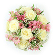 The photograph shows a lush, densely packed bouquet captured from directly above, forming an almost perfect dome of soft whites and pinks against a pure white surface. At the centre and radiating outwards, fully bloomed roses in creamy white and pale ivory open in flawless spirals, their layered petals creating a sense of depth and quiet opulence, as though they have been allowed to unfurl at their own unhurried pace. Threaded among these roses are generous clusters of pink alstroemeria, their elongated petals splayed gracefully, patterned with fine darker pink veins and subtle strokes of peach and warm yellow at the throat. These markings draw the eye inward and lend the bouquet a lively, almost conversational energy, balancing the serene presence of the roses. Surrounding and interlacing through every bloom is a cloud of baby's breath, each tiny white flower perched on a slender stem, collectively forming a hazy, lace-like surround that softens every edge and gap. Here and there, smooth, deep green leaves emerge, adding structure and a natural rhythm that suggests the bouquet has just been arranged by hand in a Gerrards Cross florist's workshop, perhaps before being delivered to a home near West Common. The overhead vantage point emphasizes the bouquet's round, carefully proportioned design, with no visible stems, only a harmonious tapestry of blossoms and foliage. The overall palette-ivory, blush pink, and crisp white-creates a gentle, romantic mood that would be perfect for weddings, vow renewals, or intimate celebrations, as well as a thoughtful, uplifting gift sent to brighten someone's day across Gerrards Cross and the surrounding Chiltern villages.