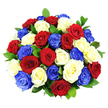 A full, rounded bouquet of about three dozen roses in red, white, and vibrant cobalt blue is presented against a crisp white studio background, allowing every bloom to stand out with striking clarity. The roses are densely packed into a classic dome, each head carefully turned so that the open, velvety petals face outward in a near-perfect circle of colour. Deep red roses add a sense of passion and ceremony, reminiscent of festive evenings around Gerrards Cross Memorial Centre, while the white roses lend an air of elegance and remembrance with their cool, luminous tones. The blue roses, a vivid cobalt shade, thread throughout the arrangement in equal measure, completing the patriotic trio and giving the bouquet a modern, eye-catching twist. Rich, dark green foliage is tucked between the blossoms, not dominating the view but providing just enough contrast to define the individual blooms and emphasise the full, luxurious shape. The lighting is bright and even, almost like clear midday light over Packhorse Road, illuminating each petal and enhancing the impression of freshness and careful preparation. No stems, vase, or ribbon are visible; the focus remains firmly on the compressed mass of colour and texture. This composition feels both bold and respectful, suitable for local remembrance gatherings, Armed Forces Day events, or heartfelt tributes delivered to homes and venues across Gerrards Cross. The overall mood is one of honour, unity, and celebration, as though the roses themselves are quietly standing to attention while still offering warmth and comfort to anyone who receives them.